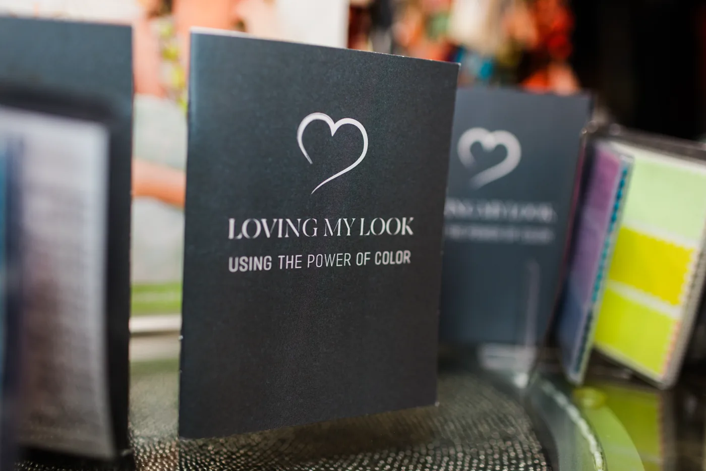 The Loving My Look color booklet and custom swatch cards a client takes home