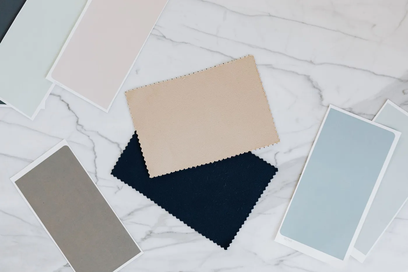 Fabric and color swatches laid out for a color analysis